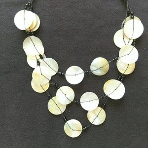 Shell threaded statement necklace